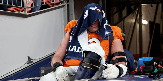 Garett Bolles of the Denver Broncos is carted off the field during a game against the Indianapolis Colts at Empower Field At Mile High Oct. 6, 2022, in Denver, Colo.