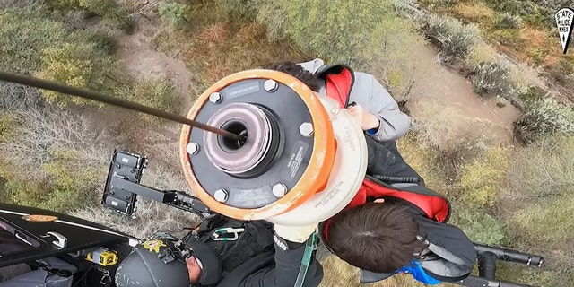 The New Mexico National Guard hoisted all 25 kids and adults to safety.