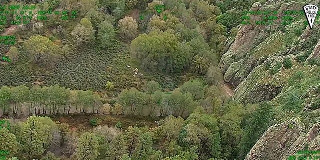 The troop had become stranded at their campsite after heavy rains caused rivers the rise.