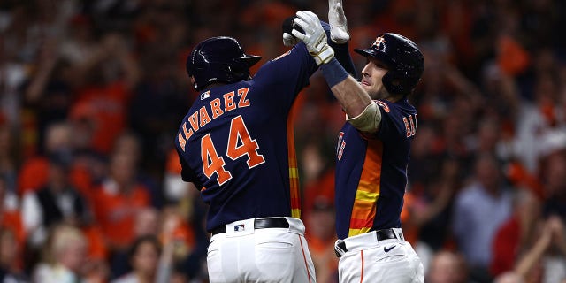 Alex Bregman #2 of the Houston Astros hits a three-run homer against the New York Yankees against Jordan Alvarez #44 in the third inning of Game 2 of the American League Championship Series at Minute Maid Park in Houston on October 20, 2022. celebrate the  ,Texas.