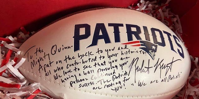 The autographed football the New England Patriots and owner Robert Kraft sent to Brockton HS football player McKenzie Quinn after scoring the first touchdown in school history as a female.  