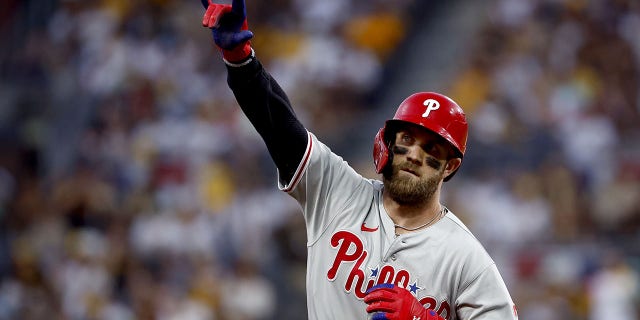 Bryce Harper #3 of the Philadelphia Phillies reacts after hitting a home run during the fourth inning against the San Diego Padres in game one of the National League Championship Series at PETCO Park on October 18, 2022 in San Diego, California.