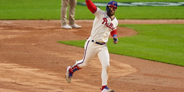 Bryce Harper #3 of the Philadelphia Phillies runs the bases after hitting a two run home run during the eighth inning against the San Diego Padres in game five of the National League Championship Series at Citizens Bank Park on October 23, 2022, in Philadelphia, Pennsylvania.