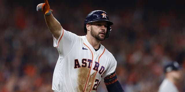 Chas McCormick #20 of the Houston Astros hits a single home run during the sixth inning against the New York Yankees in one of the American League Championship Series at Minute Maid Park on October 19, 2022 in Houston, Texas.