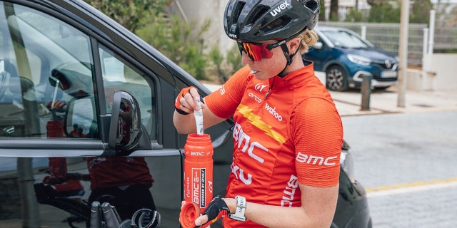 Chelsea Sodaro is shown preparing for a bike ride while training for the IRONMAN World Championship in Hawaii.  