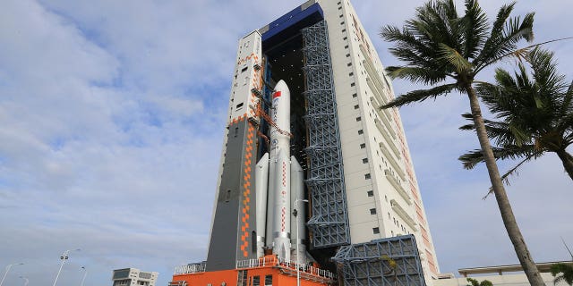 In this photo released by Xinhua News Agency, China's space station lab module Mengtian and the rocket Long March-5B Y4 is transported to the launch area at the Wenchang Satellite Launch Center in south China's Hainan Province on Oct. 25, 2022.