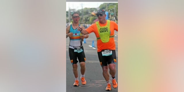 Grieb (shown at right) helped train Nikic (left) for his first-ever Ironman race back in 2020. 