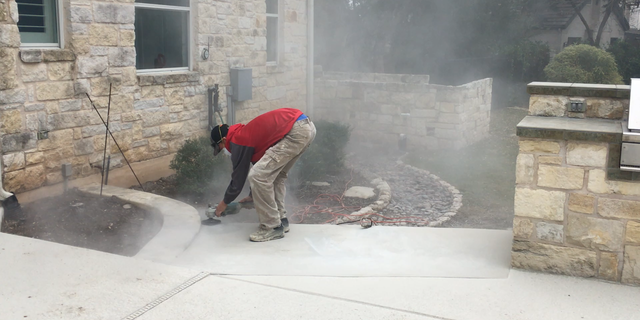 Christopher Branham working for the small decorative concrete company he owned