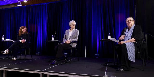 Republican nominee Christine Drazan, left, and Democratic nominee Tina Kotek, middle, listen to unaffiliated candidate Betsy Johnson speak during the gubernatorial debate hosted by Oregon Newspaper Publishers Association at Mount Hood Oregon Resort in Welches, Ore., Friday, July 29, 2022.