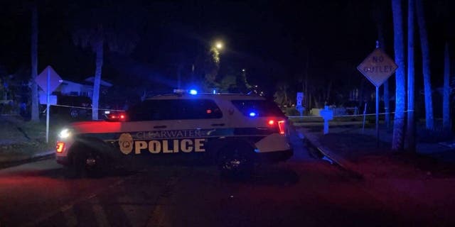 Police in Clearwater, Fla. respond to Mandalay Avenue to investigate the violent attack of a bicyclist Friday, Oct. 21, 2022.