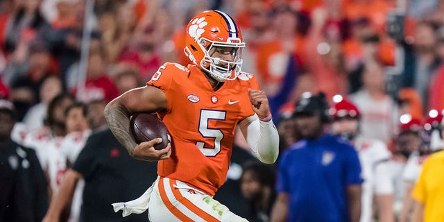 Clemson quarterback DJ Uiagalelei (5) runs with the ball in the second half of an NCAA college football game against North Carolina State, Saturday, Oct. 1, 2022, in Clemson, S.C.