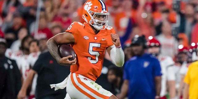 Clemson quarterback DJ Uiagalelei (5) runs with the ball in the second half of an NCAA college football game against North Carolina State, Saturday, Oct. 1, 2022, in Clemson, S.C.