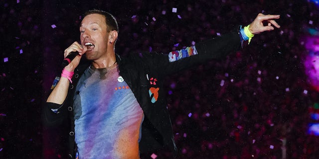 Chris Martin battling 'serious lung infection;' Coldplay 'forced to ...