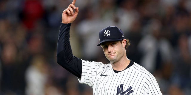 Gerrit Cole #45 of the New York Yankees celebrates closing out the top of the 6th inning against the Cleveland Guardians in Game 1 of the American League Division Series at Yankee Stadium on October 11, 2022 in New York, NY.