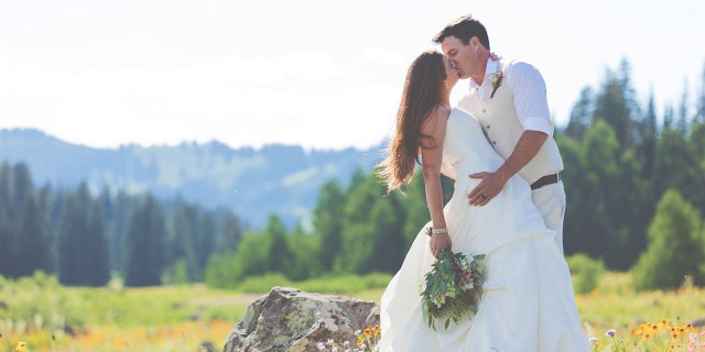 A couple says, "I do," in the Colorado Grand Mesa National Forest area in July 2022.