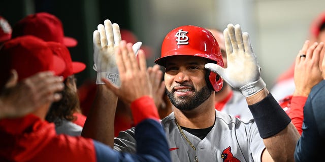 Albert Pujols #5 of the St. Louis Cardinals celebrates his two-run home run during the sixth inning against the Pittsburgh Pirates at PNC Park on October 3, 2022 in Pittsburgh, Pennsylvania.