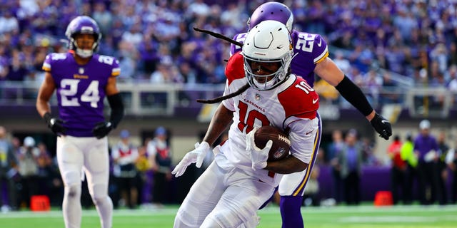 DeAndre Hopkins of the Arizona Cardinals catches the ball for a touchdown against the Vikings at U.S. Bank Stadium on Oct. 30, 2022, in Minneapolis, Minnesota.