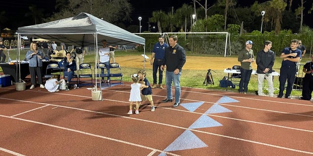 Govenor Ron DeSantis attends a football game at Naples High School just 10 days after Hurricane Ian ravaged the area