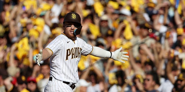 Brandon Drury of the San Diego Padres reacts after hitting a two-run RBI single during the fifth inning against the Philadelphia Phillies in Game 2 of the National League Championship Series at PETCO Park Oct. 19, 2022, in San Diego.