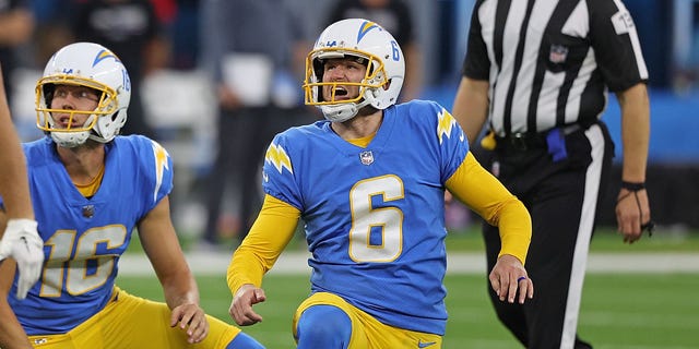 Dustin Hopkins #6 of the Los Angeles Chargers drops to a knee following a field goal kick against the Denver Broncos during the second quarter at SoFi Stadium on October 17, 2022 in Inglewood, California.