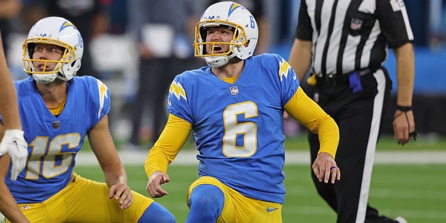 Dustin Hopkins #6 of the Los Angeles Chargers drops to a knee following a field goal kick against the Denver Broncos during the second quarter at SoFi Stadium on October 17, 2022 in Inglewood, California.