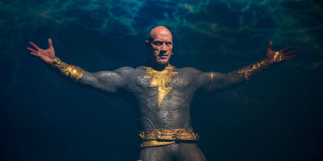Dwayne "The Rock" Johnson appears at the Warner Brothers panel promoting his upcoming film "Black Adam" at 2022 Comic-Con.