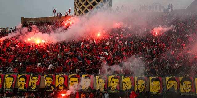 Egyptian soccer fans commemorate fallen fans of a 2012 riot that killed 72 people following a 3-1 victory by El Masry against Al Ahly. Picture taken at Mokhtar Altitch Stadium in Cairo, Egypt, on Feb. 1, 2016.