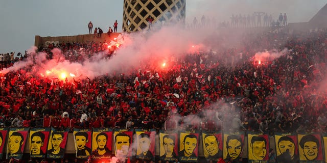 Egyptian soccer fans commemorate fallen fans of a 2012 riot that killed 72 people following a 3-1 victory by El Masry against Al Ahly. Picture taken at Mokhtar Altitch Stadium in Cairo, Egypt, on Feb. 1, 2016.