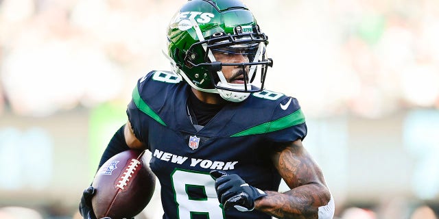 Elijah Moore of the New York Jets throws the ball against the Philadelphia Eagles on Dec. 5, 2021, in East Rutherford, NJ.