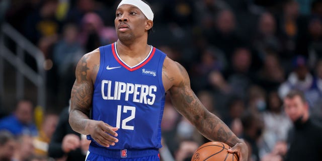 Eric Bledsoe of the Los Angeles Clippers dribbles in the second quarter against the Indiana Pacers at Gainbridge Fieldhouse Jan. 31, 2022, in Indianapolis.