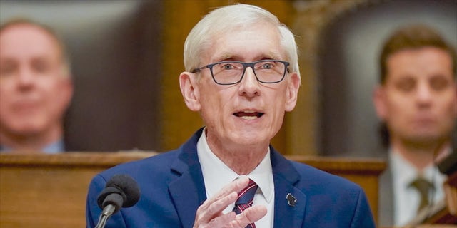 Incumbent Gov. Tony Evers said he supports halving the number of inmates. 