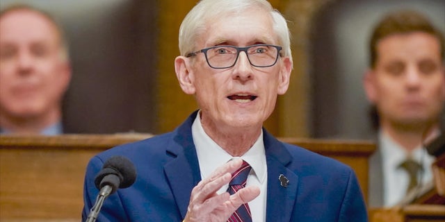 Incumbent Gov. Tony Evers said he supports halving the number of inmates. 