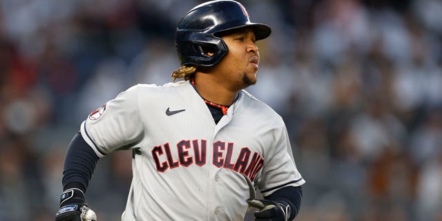 Jose Ramirez #11 of the Cleveland Guardians hits a single against the New York Yankees during the sixth inning in game five of the American League Division Series at Yankee Stadium on October 18, 2022 in New York, New York.