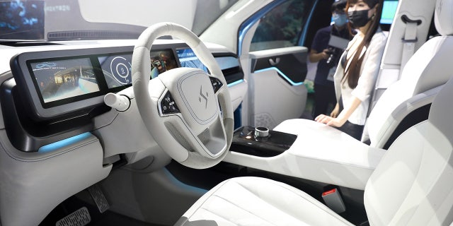The Model V uses cameras instead of mirrors for the side view.