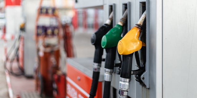 Details from gas station. Gasoline pistols close up shot.