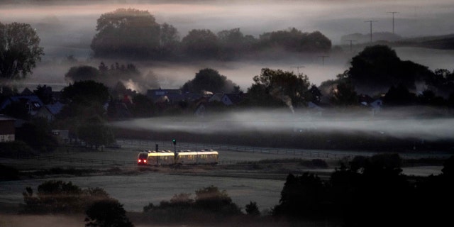 Germany's planned global public transport ticket would cost riders $ 47 per month, either as a one-time purchase or as a rolling monthly purchase.  Pictured: A regional train travels through Frankfurt, Germany on October 7, 2022.