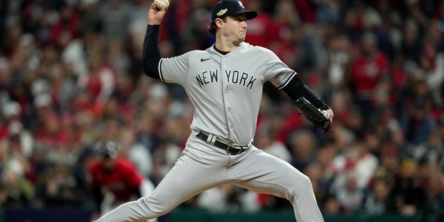 Gerrit Cole of the New York Yankees throws a pitch against the Cleveland Guardians during the first inning of Game 4 of the American League Division Series at Progressive Field on October 16, 2022 in Cleveland.