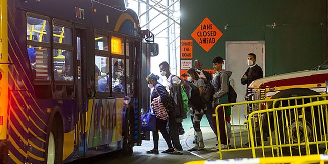 Migrants leave for a shelter from the Port Authority bus terminal on Sept. 27, 2022. New York City will set up and open transitory humanitarian emergency response and relief centers in the coming weeks to handle the influx of migrants.