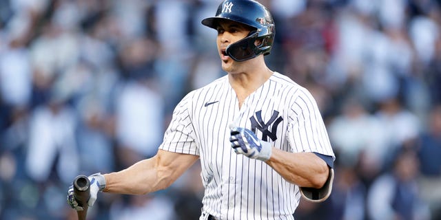 Giancarlo Stanton of the New York Yankees reacts after hitting a three-run home run against the Cleveland Guardians during the first inning in Game 5 of an American League Division Series at Yankee Stadium Oct. 18, 2022, in New York.