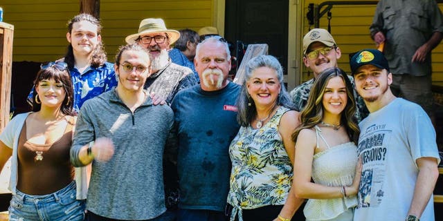 The Martins and Monroes take a picture at a family reunion! L-R: Lauren, Peter, Thomas and Trey Monroe; Chris, Brooke, Matthew, Nora, and Christopher Martin.