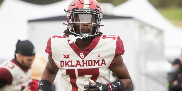 Oklahoma Sooners defensive back Damond Harmon jogs onto the field prior to a game against the Kansas Jayhawks Oct. 23, 2021, at Memorial Stadium in Lawrence, Kan.