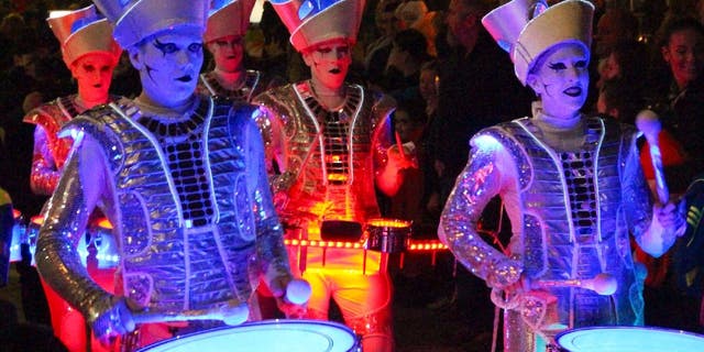 Halloween celebrants in Scotland don scary costumes and participate in parades. Here in this file photo, illuminated ghost paraders march through the streets of Paisley, Scotland Oct. 31, 2014.