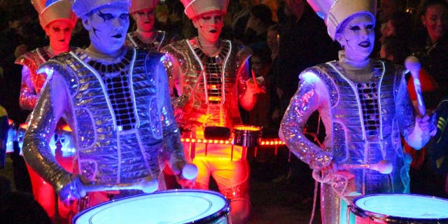 Halloween celebrants in Scotland don scary costumes and participate in parades. Here in this file photo, illuminated ghost paraders march through the streets of Paisley, Scotland Oct. 31, 2014.