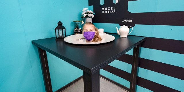 Some optical illusions defy the imagination, such as this one from a museum in Croatia. Where's the rest of the girl's body?