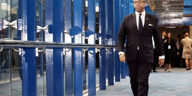 Britain's Foreign Secretary James Cleverly, pictured here in Birmingham, England, on Oct. 4, 2022, believes that the sanctions leveraged against Iran by Britain "send a clear message to the Iranian authorities."
