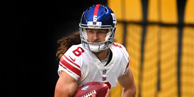Jamie Gillan of the New York Giants in action during a game against the Green Bay Packers at Tottenham Hotspur Stadium Oct. 9, 2022, in London.