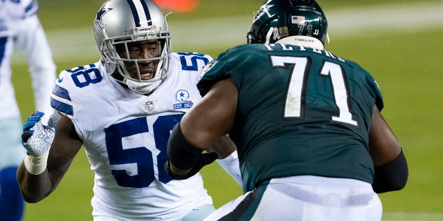 Jason Peters (71) of the Philadelphia Eagles protects the pocket from Aldon Smith (58) of the Dallas Cowboys during a game Nov. 1, 2020, in Philadelphia.