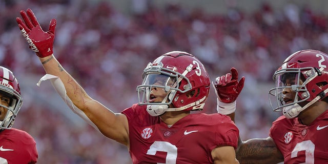 Jermaine Burton (3) of the Alabama Crimson Tide blows a kiss to fans after an early touchdown against the Utah State Aggies at Bryant Denny Stadium Sept. 3, 2022, in Tuscaloosa, Ala.