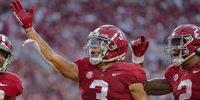 Jermaine Burton #3 of the Alabama Crimson Tide blows a kiss to the fans after an early touchdown against the Utah State Aggies at Bryant Denny Stadium on September 3, 2022 in Tuscaloosa, Alabama.