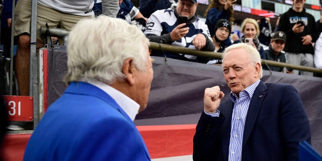 Dallas Cowboys owner Jerry Jones and New England Patriots owner Robert Kraft talk before their game at Gillette Stadium on October 17, 2021 in Foxborough, Massachusetts. 